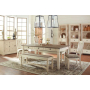 Bolanburg - Beige - 9 Pc. - Dining Room Table, 2 Side Chairs, Bench (2), Server, 3 Cabinets